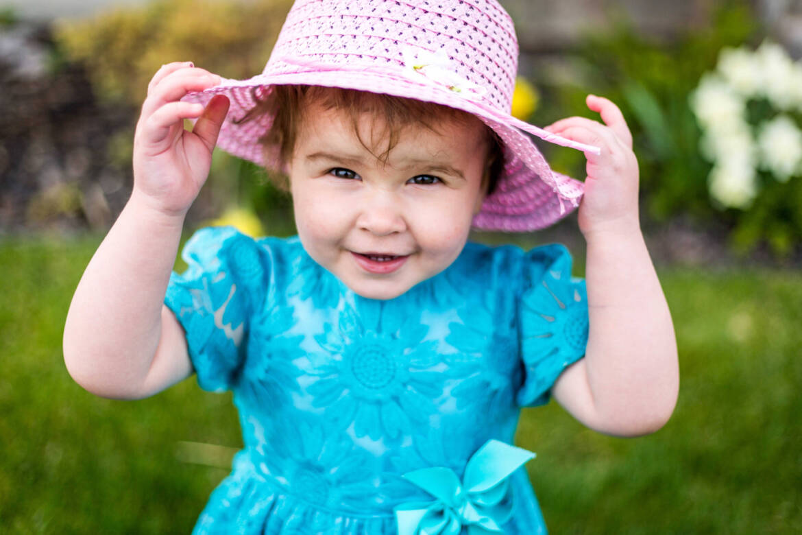 FAM_little-girl-w-hat-scaled.jpg